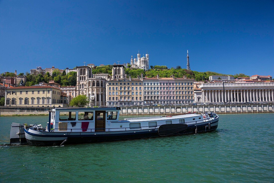 France, Rhone, Lyon, historical site listed as World Heritage by UNESCO,district Cordeliers, barge on the Saone, the Cathedral Saint Jean, the Law court and the basilica Notre-Dame of Fourvière