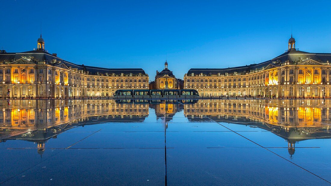 France, Gironde, Bordeaux, area listed as World Heritage by UNESCO, on the Place de la Bourse, the Palais de la Bourse eighteenth century, the fountain of the Three Graces and the tram reflecting in Mirror Water from 2006 and directed by Jean Max Llorca caretaker and architect Pierre Gangnet and planner Michel Corajoud