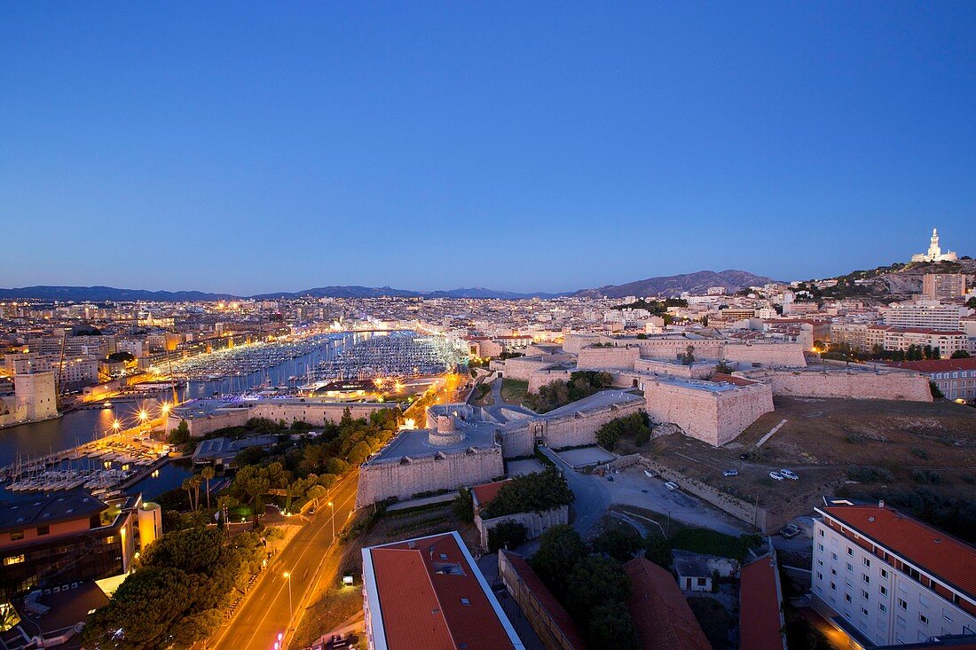 France, Bouches du Rhone, Marseille, district Pharo, Citadel Saint Nicolas Historical Monument, Fort d'Entrecasteaux and Fort Ganteaume (17th century), boulevard Charles Livon, the Vieux Port and Notre Dame de la Garde in background