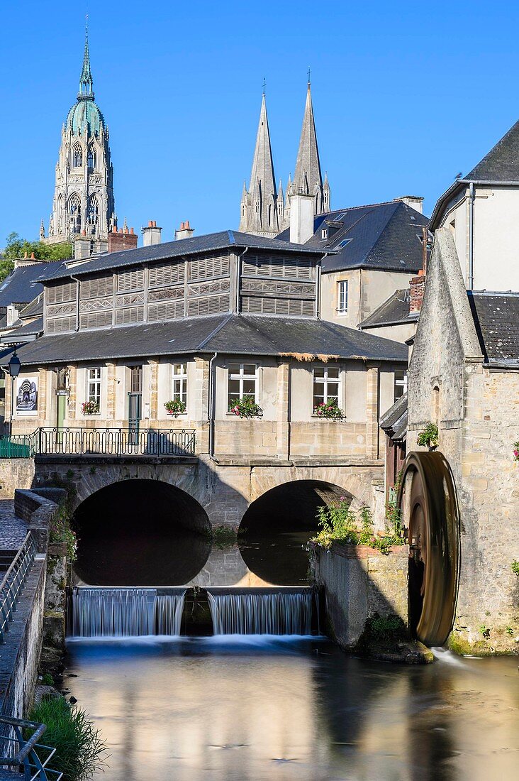 France, Calvados, Bayeux, watermill on the Aure river in the former tanning district and Notre Dame cathedral (11th to 15th century)
