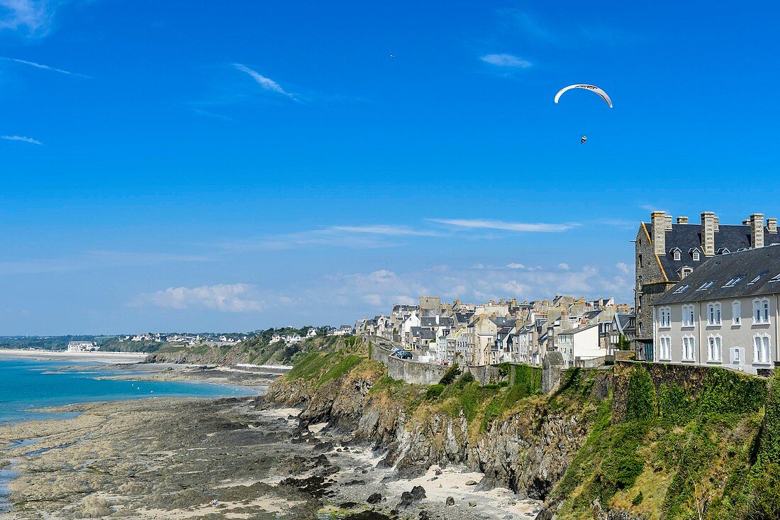 France, Manche, Cotentin, Granville, the Upper Town built on a rocky headland on the far eastern point of the Mont Saint Michel Bay, paraglider