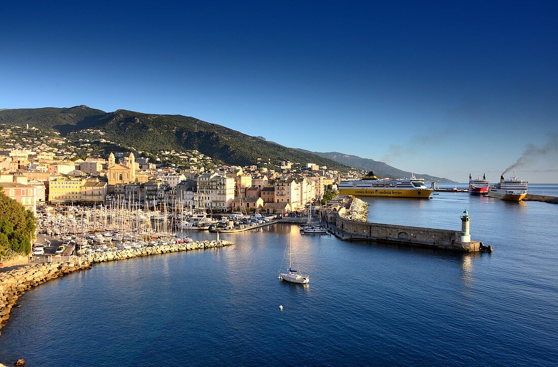 Port with ferries and old town Bastia in the morning light, northern Corsica, France