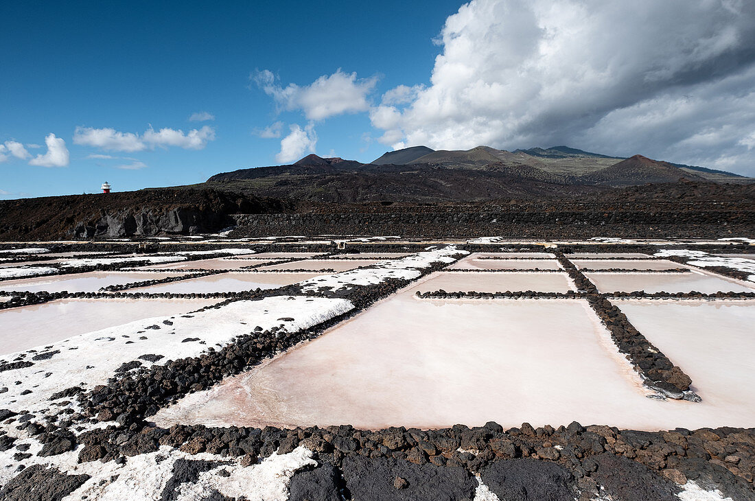 View of the salt pans at Fuencaliente, in the background the volcano of Teneguía, La Palma, Canary Islands, Spain, Europe