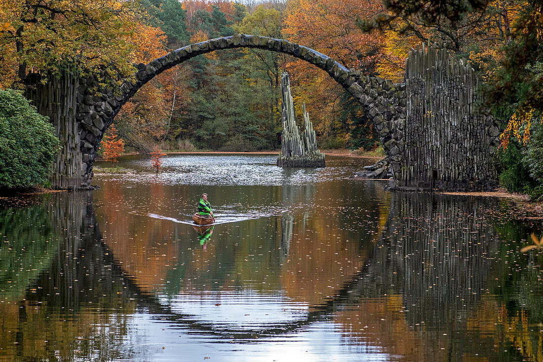 Canoeing in autumn on the Rakotzsee, Saxony, Germany