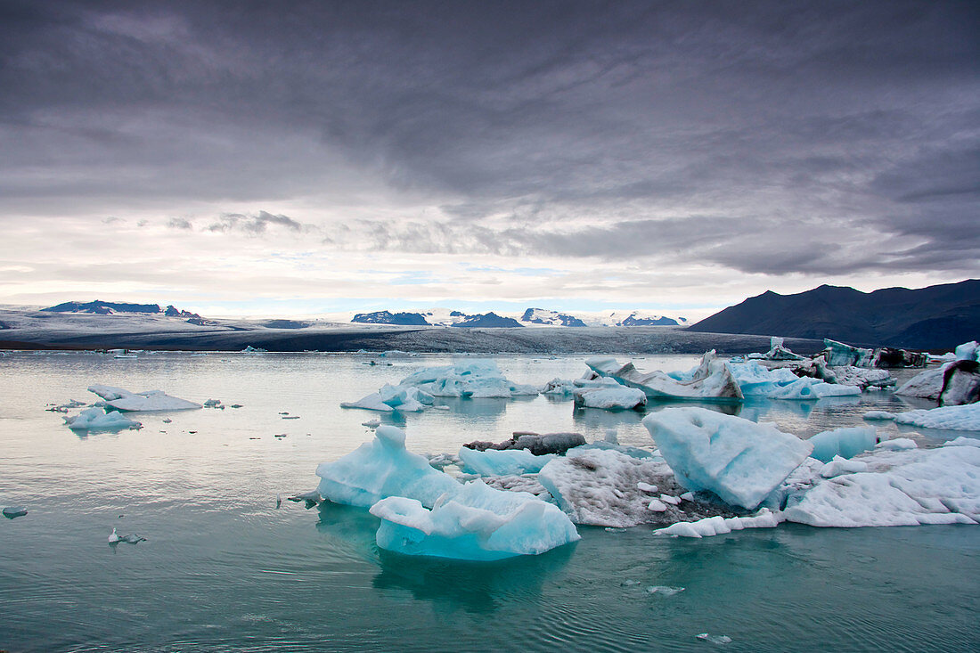 View of the Jokulsarlon glacier lagoon in southeast Iceland, with the Breidarmerkurjokull glacier tongue in the background, Iceland, Europe