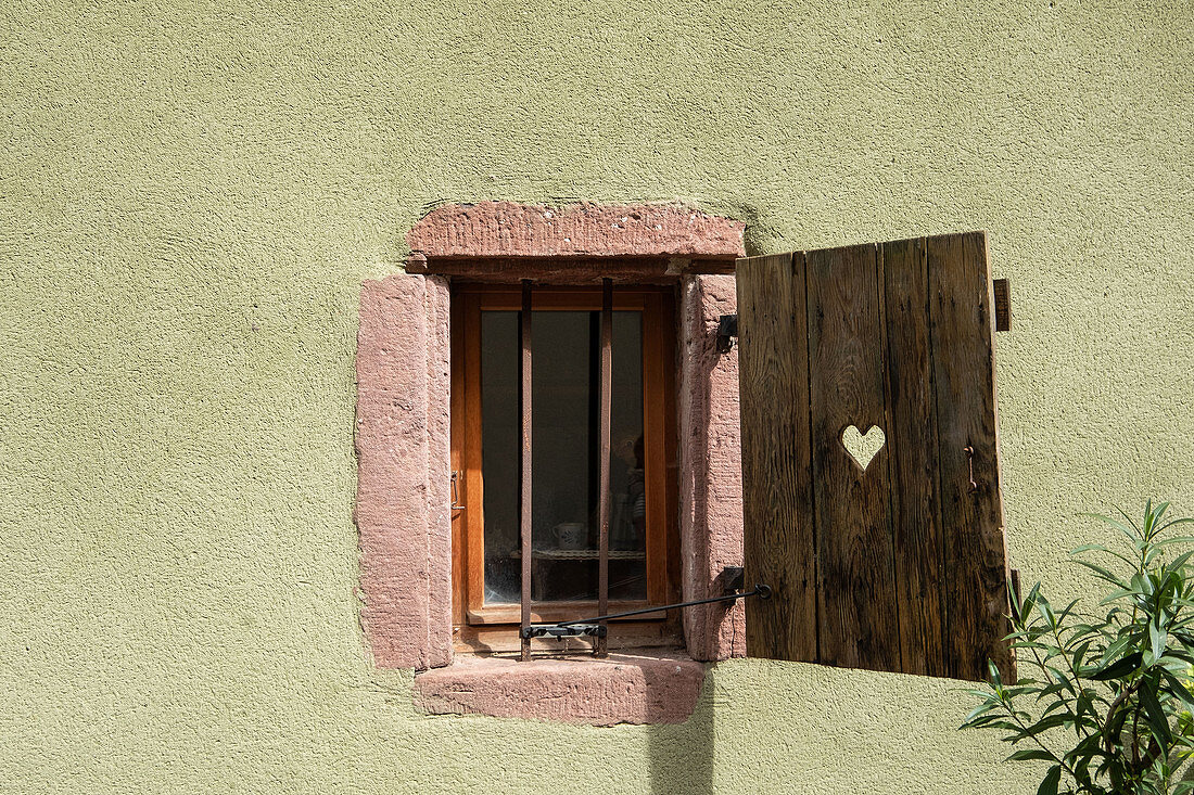 Shutters in half-timbered house in Eguisheim in Alsace, France, Europe