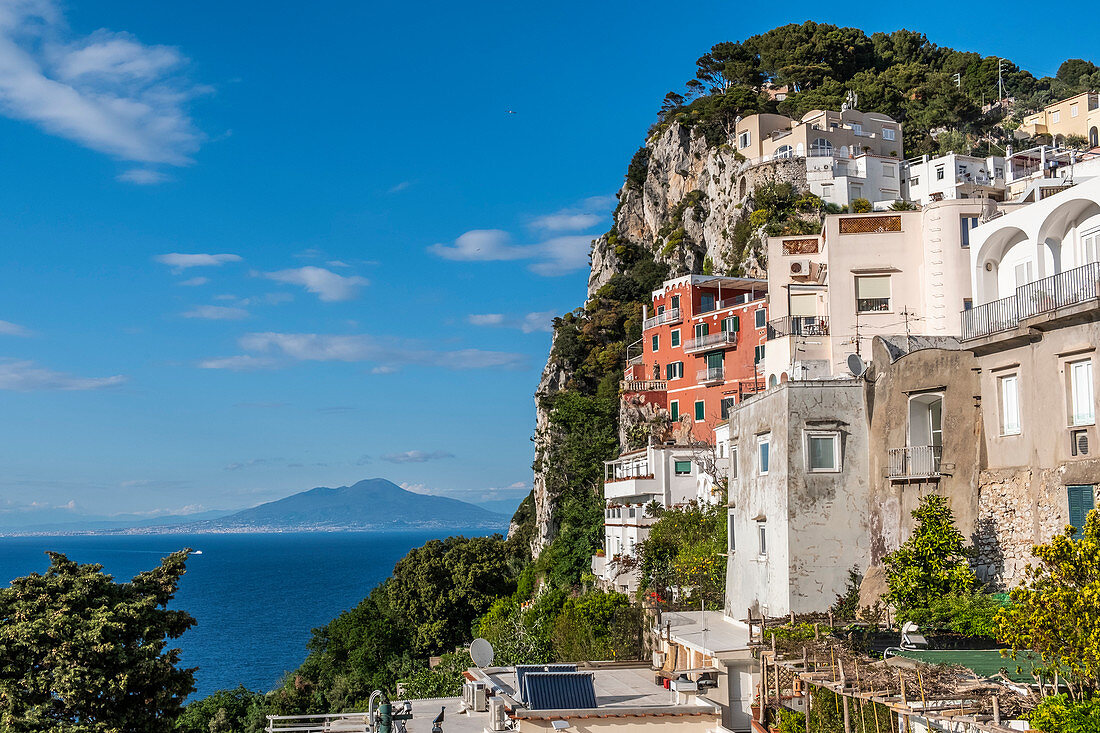View of houses from Capri and Vesuvius in the background, Capri Island, Gulf of Naples, Italy
