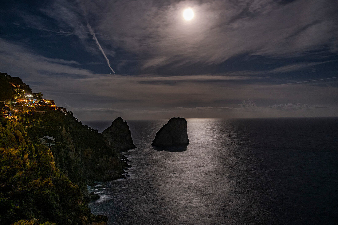 Capri and the Faraglioni rocks at full moon, Capri Island, Gulf of Naples, Italy