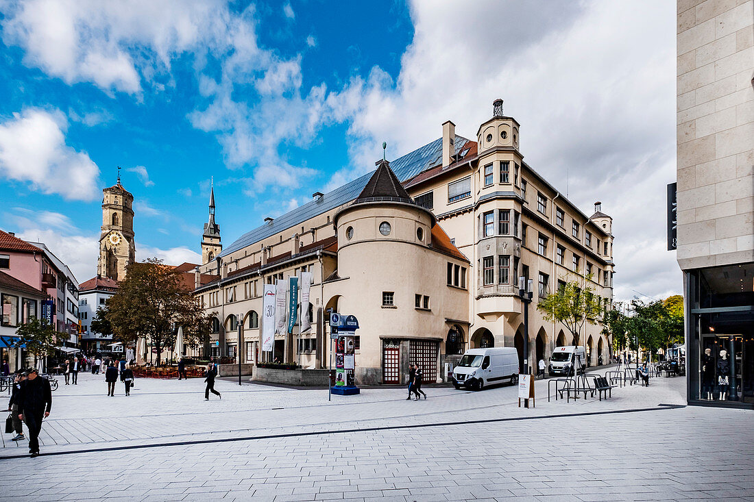 Entrance to the market hall in the Dorotheenviertel with the collegiate church in the background, Stuttgart, Baden-Württemberg, Germany