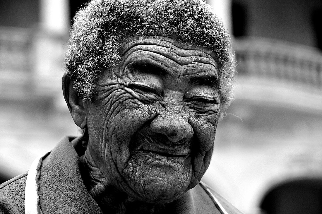 Portrait of an old woman with beautifully drawn wrinkles on her face. Havana. Cuba