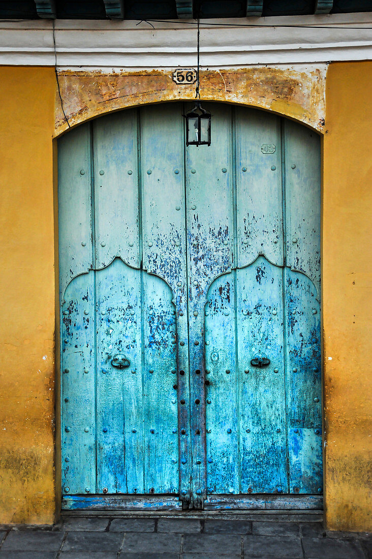 Blue gate in the streets of Trinidad. Cuba.