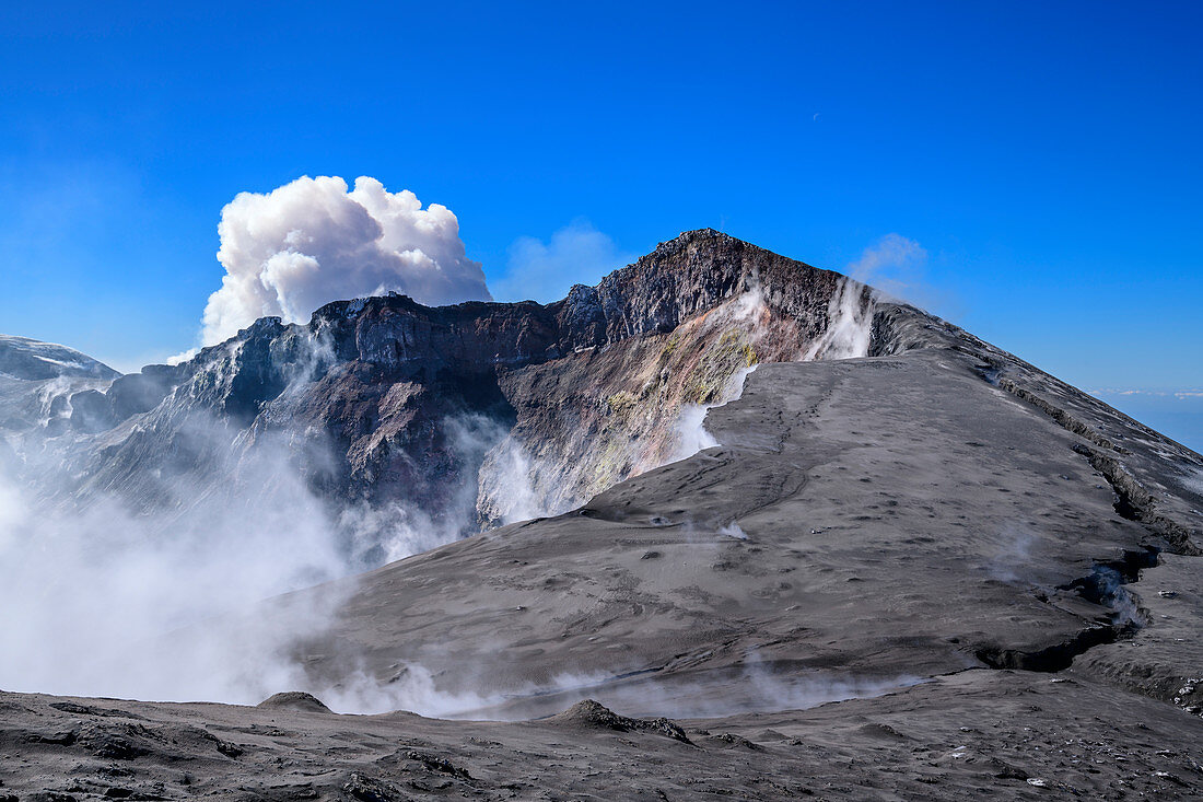 Cloud rises over Mount Etna volcano crater, Monte Etna UNESCO World Heritage Site, Etna, Etna, Sicily, Italy