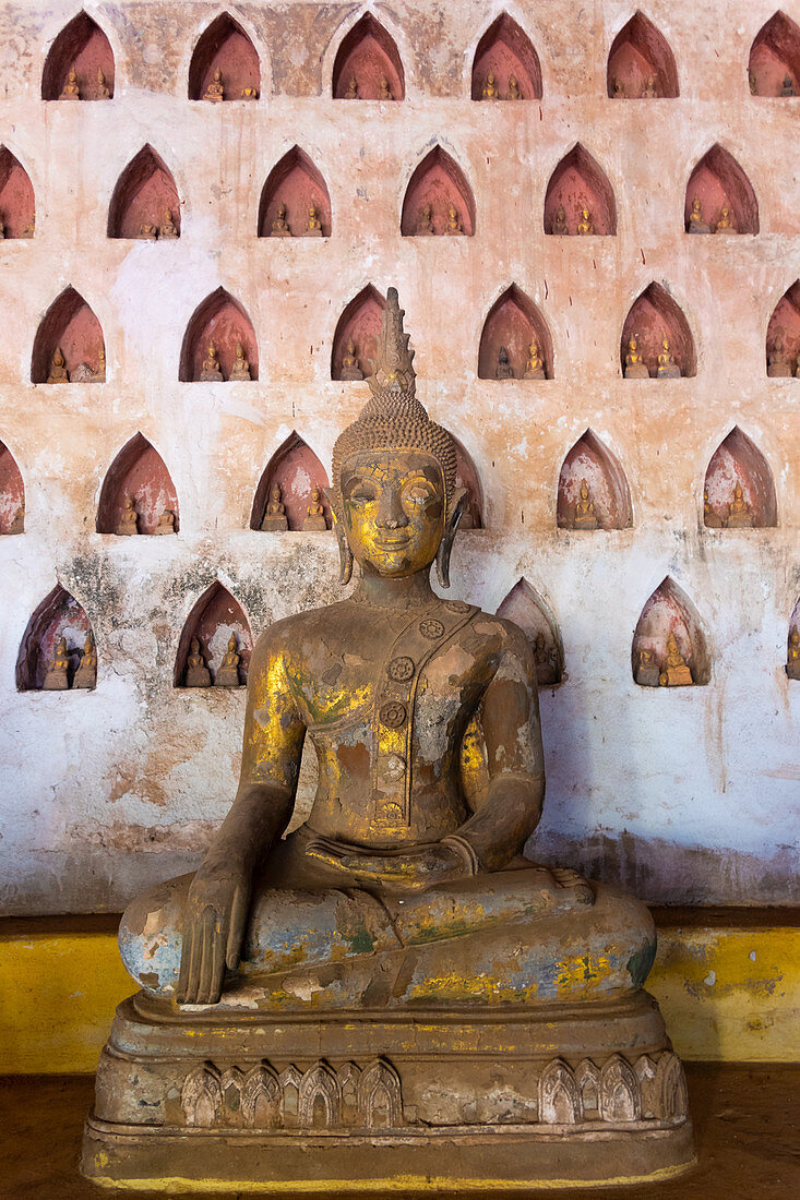 Wat Si Saket,  a collection of statues in wall niches, Vientiane, Laos