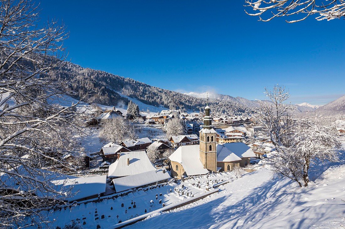 France, Haute-Savoie, Morzine, the valley of Aulps, ski slopes of the Portes du Soleil, seen on the church Sainte-Marie-Madeleine of 1805