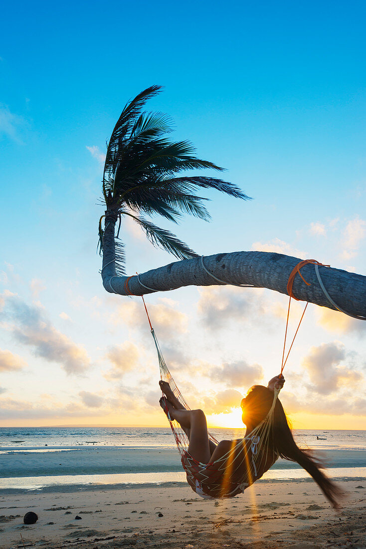 Girl in hammock on Sugar Beach, Bantayan Island, Cebu, The Visayas, Philippines, Southeast Asia, Asia