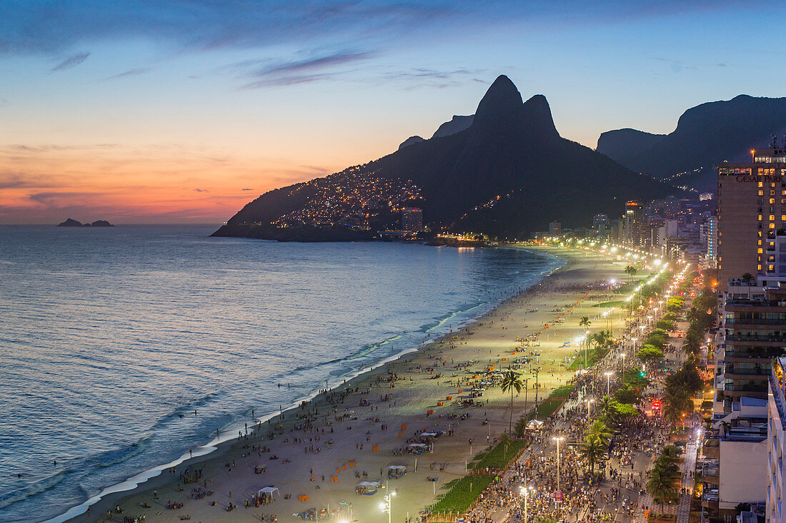 Sunset over Ipanema Beach and Dois Irmaos (Two Brothers) mountain, Rio de Janeiro, Brazil, South America