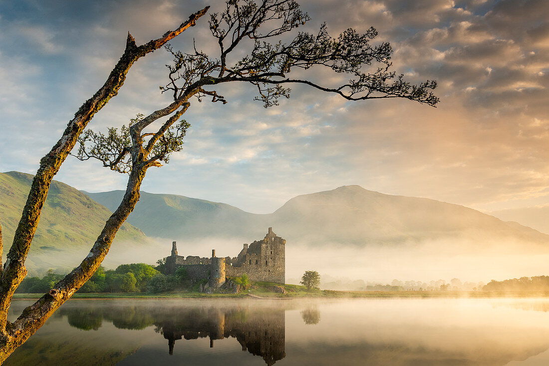 Kilchurn Castle at sunrise in Scotland, Europe