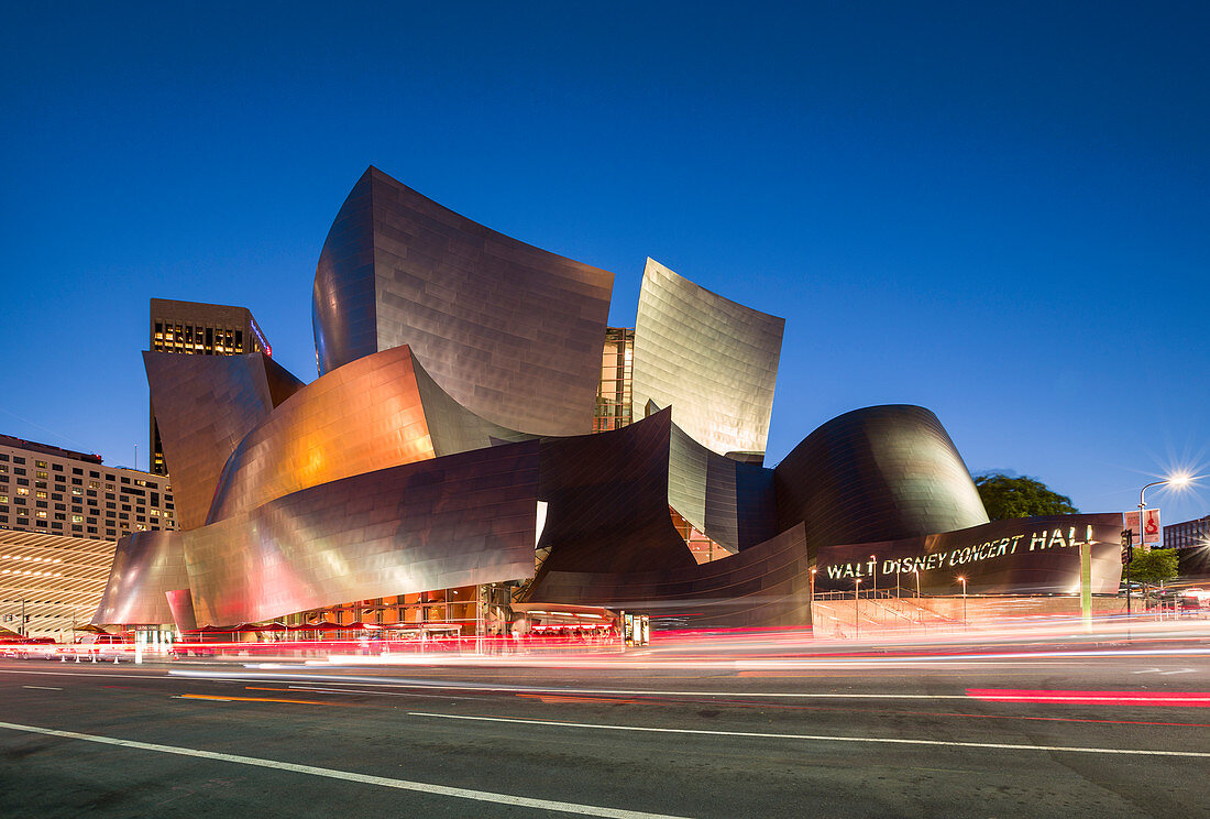 Walt Disney Concert Hall in Los Angeles at dusk with car lights