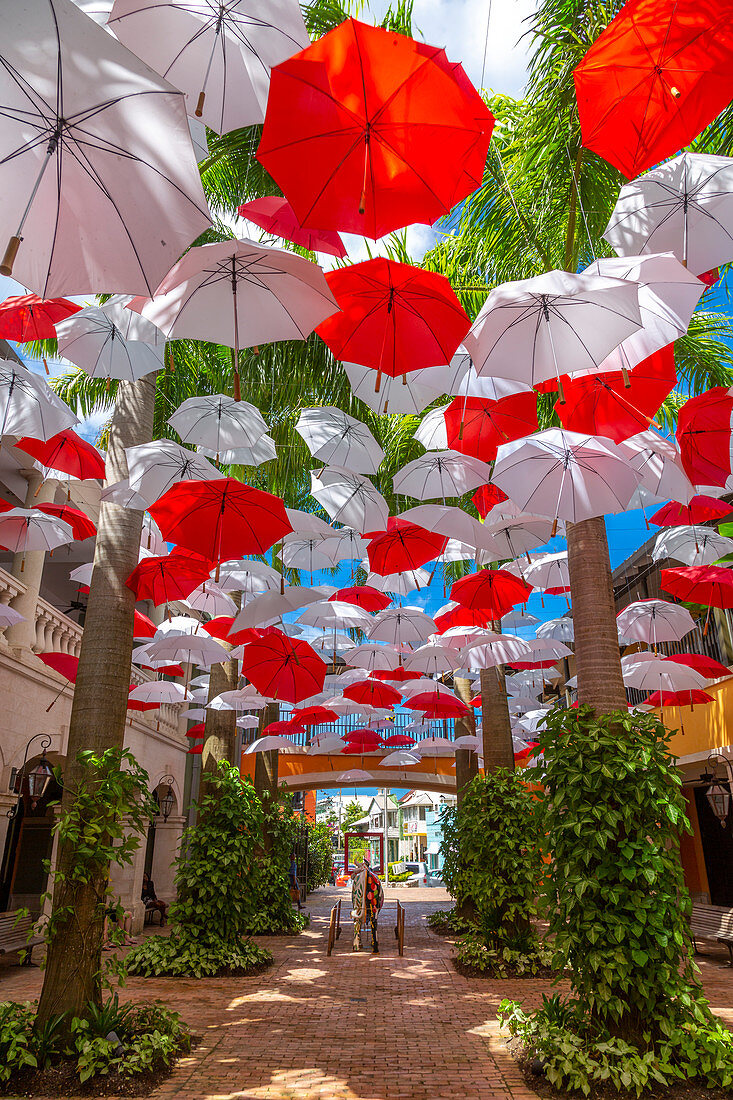 Red and white umbrellas in shopping mall at Holetown, Barbados, West Indies, Caribbean, Central America