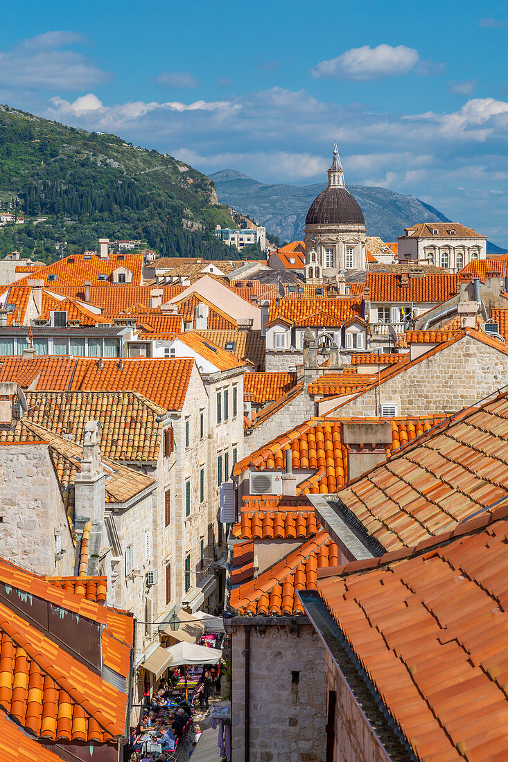 View of red rooftops and Dubrovnik Cathedral, Dubrovnik Old Town, UNESCO World Heritage Site, and Adriatic Sea, Dubrovnik, Dalmatia, Croatia, Europe