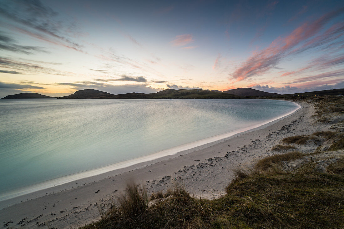 Winter sunrise at Bagh Bhatarsaigh (Vatersay Bay), Vatersay, the most southerly inhabited island of the Outer Hebrides, Scotland, United Kingdom, Europe