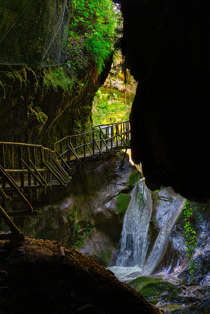 Caglieron caves, waterfall and wooden trail in the caves, Veneto, Italy, Europe
