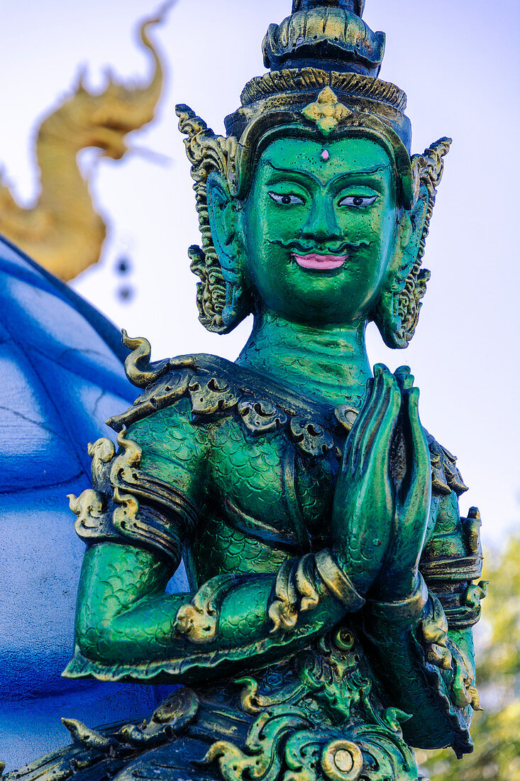 Green Yaksha statue at Wat Rong Suea Ten (Blue Temple) in Chiang Rai, Thailand, Southeast Asia, Asia