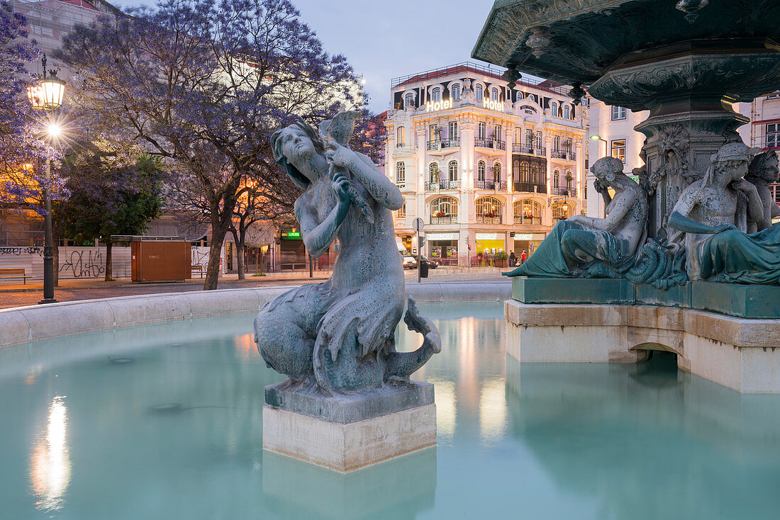 Fountain in front of the Teatro Nacional D. Maria II, Praca Rossio, Lisbon, Portugal