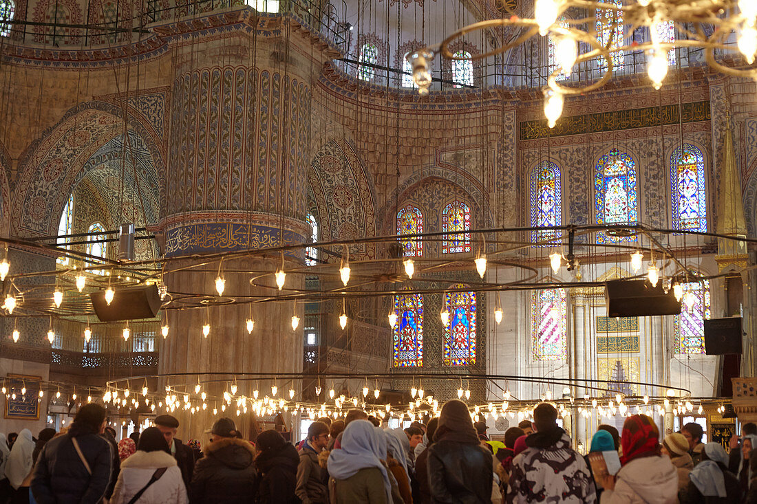 Tourists in the Blue Mosque in Istanbul, Turkey