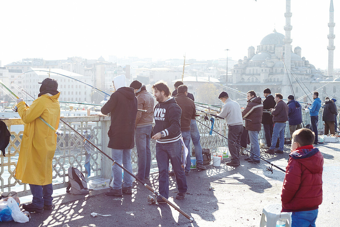 Fishermen on the Galata Bridge in Istanbul, Turkey.