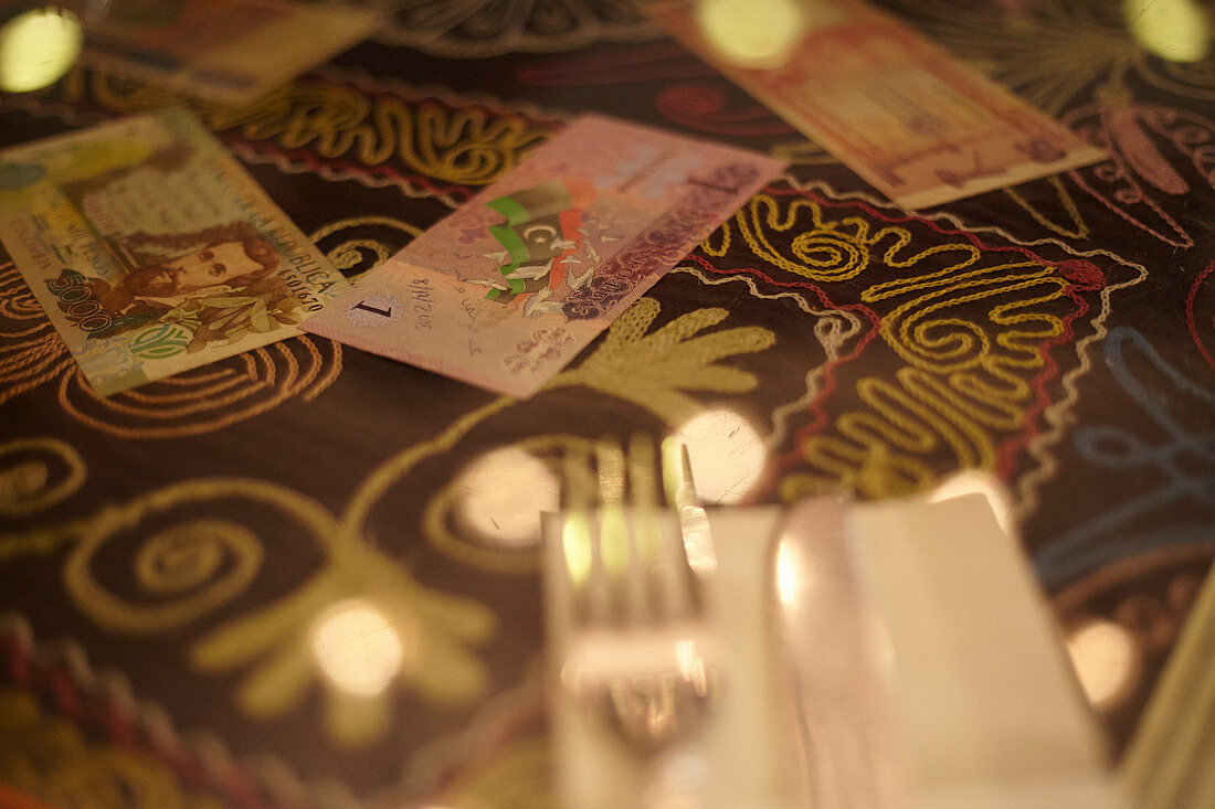 Lira bills on a tablecloth in a restaurant. Istanbul, Turkey.