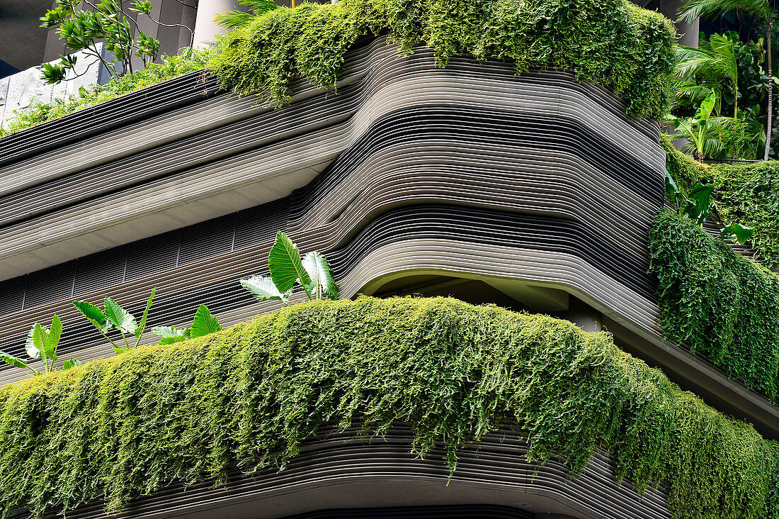 Facade greenery and unusual architecture of a skyscraper in Singapore