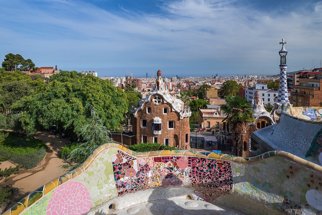 Mosaic bench with a view of the city from Park Guell in Barcelona