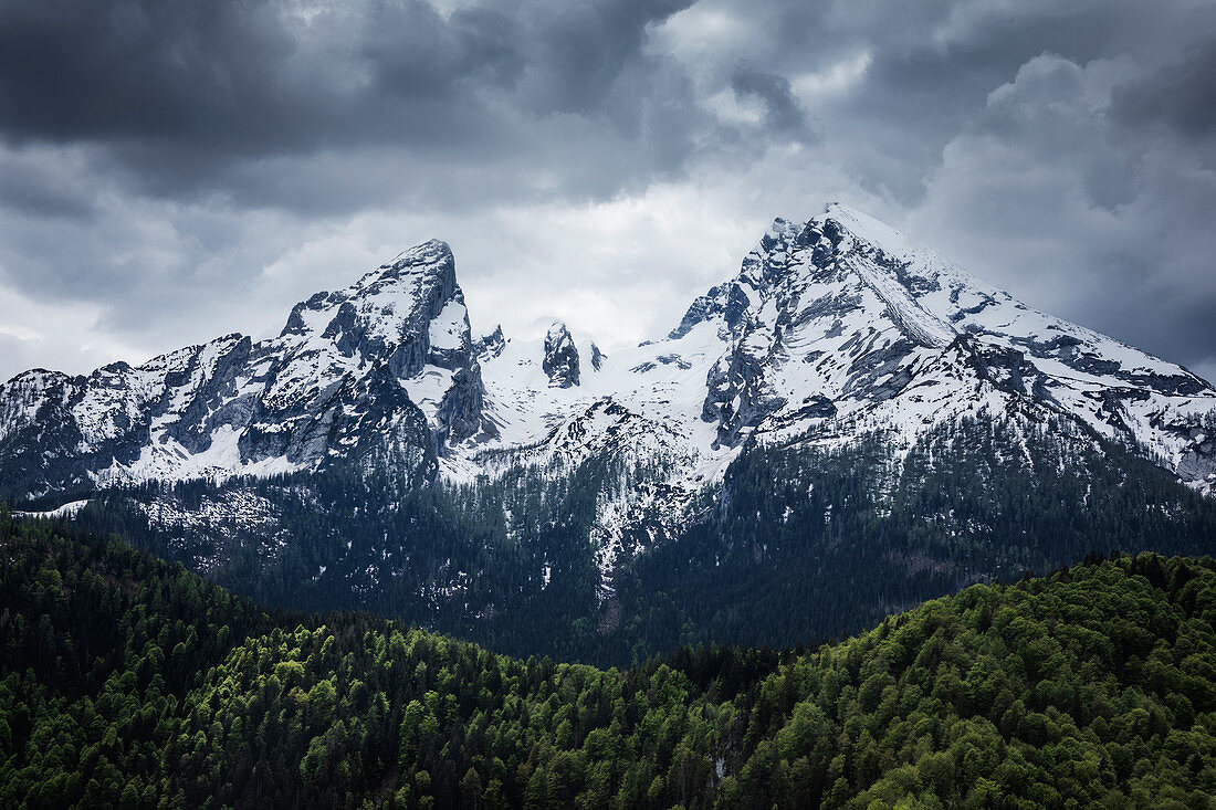 Snow-covered summit of the Watzmann in Berchtesgaden with dramatic clouds, Bavaria