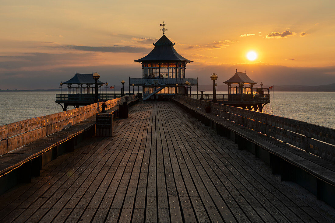 Sunset over Clevedon Pier and its pagoda, Clevedon, Somerset, England, United Kingdom, Europe