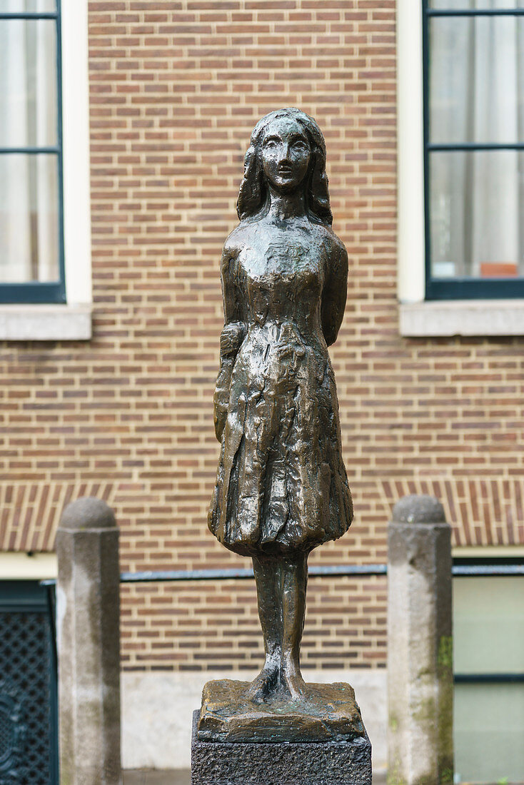 Statue of Anne Frank outside Westerkerk Church, Amsterdam, North Holland, The Netherlands, Europe