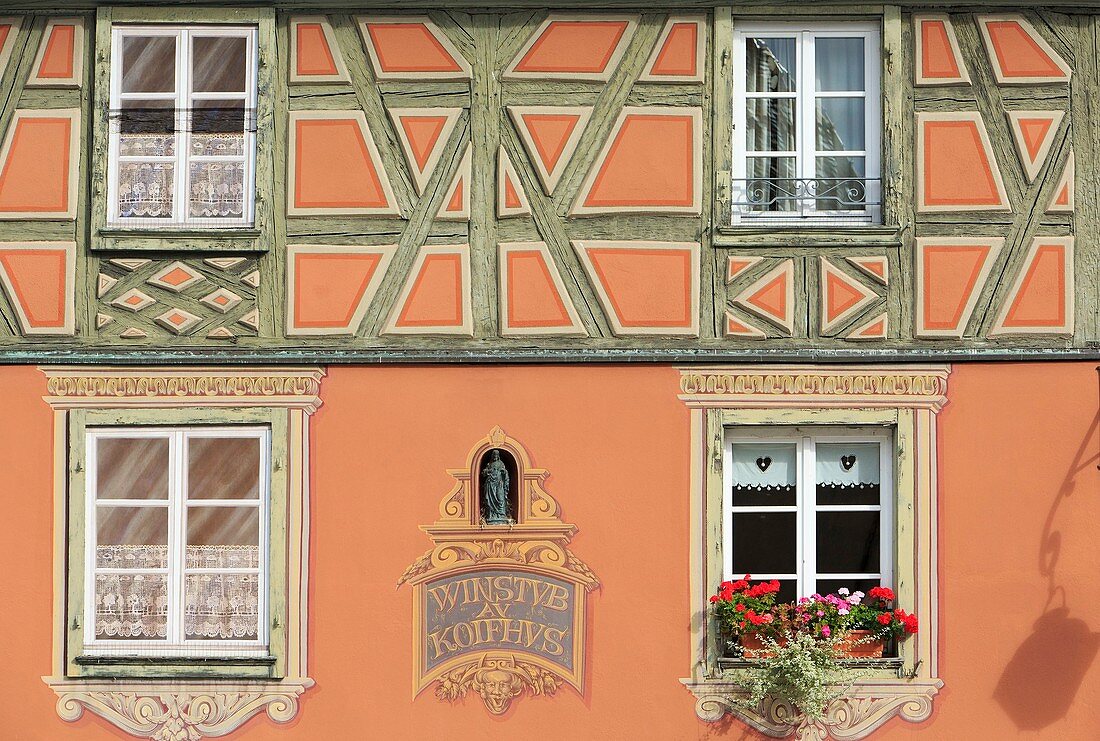 France, Haut Rhin, route des Vins d'Alsace, Colmar, facade of a half timbered house in trompe l'oeil on Place de l'Ancienne Douane (former custom square)