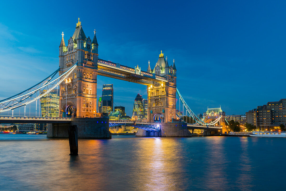 Tower Bridge over River Thames, City of London skyline including Cheesegrater and Gherkin skyscrapers, London, England, United Kingdom, Europe