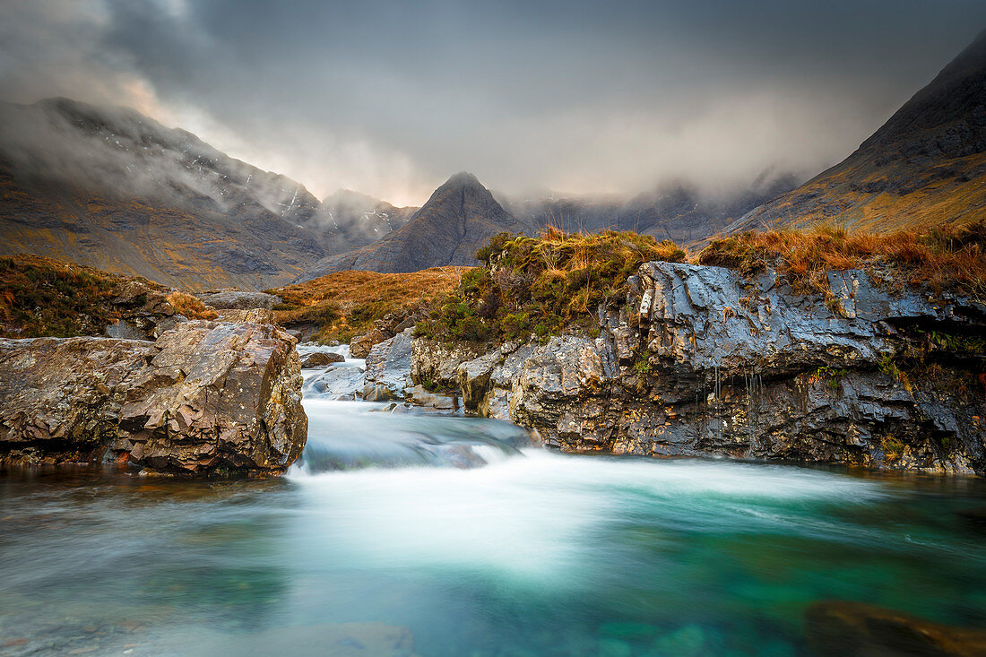 The Black Cuillin mountains in Glen Brittle from the Fairy Pools, Isle of Skye, Inner Hebrides, Scotland, United Kingdom, Europe