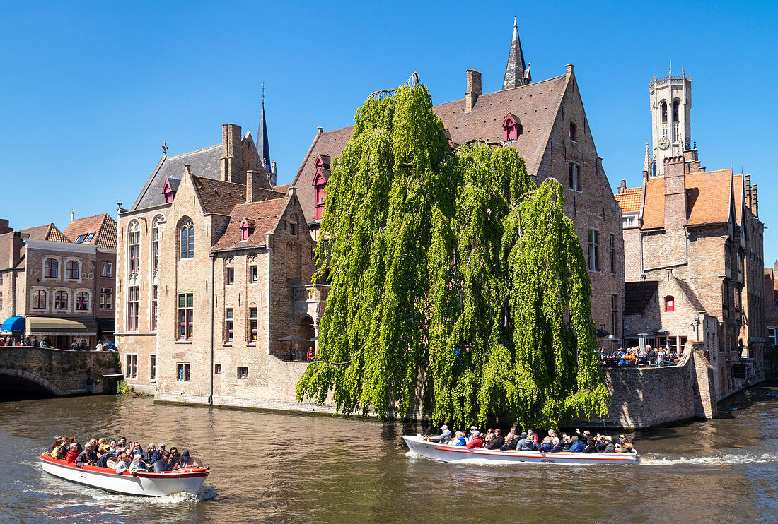 Bruges Belfry and tourist boats on Den Dijver Bruges Canal, Bruges, UNESCO World Heritage Site, West Flanders, Belgium, Europe