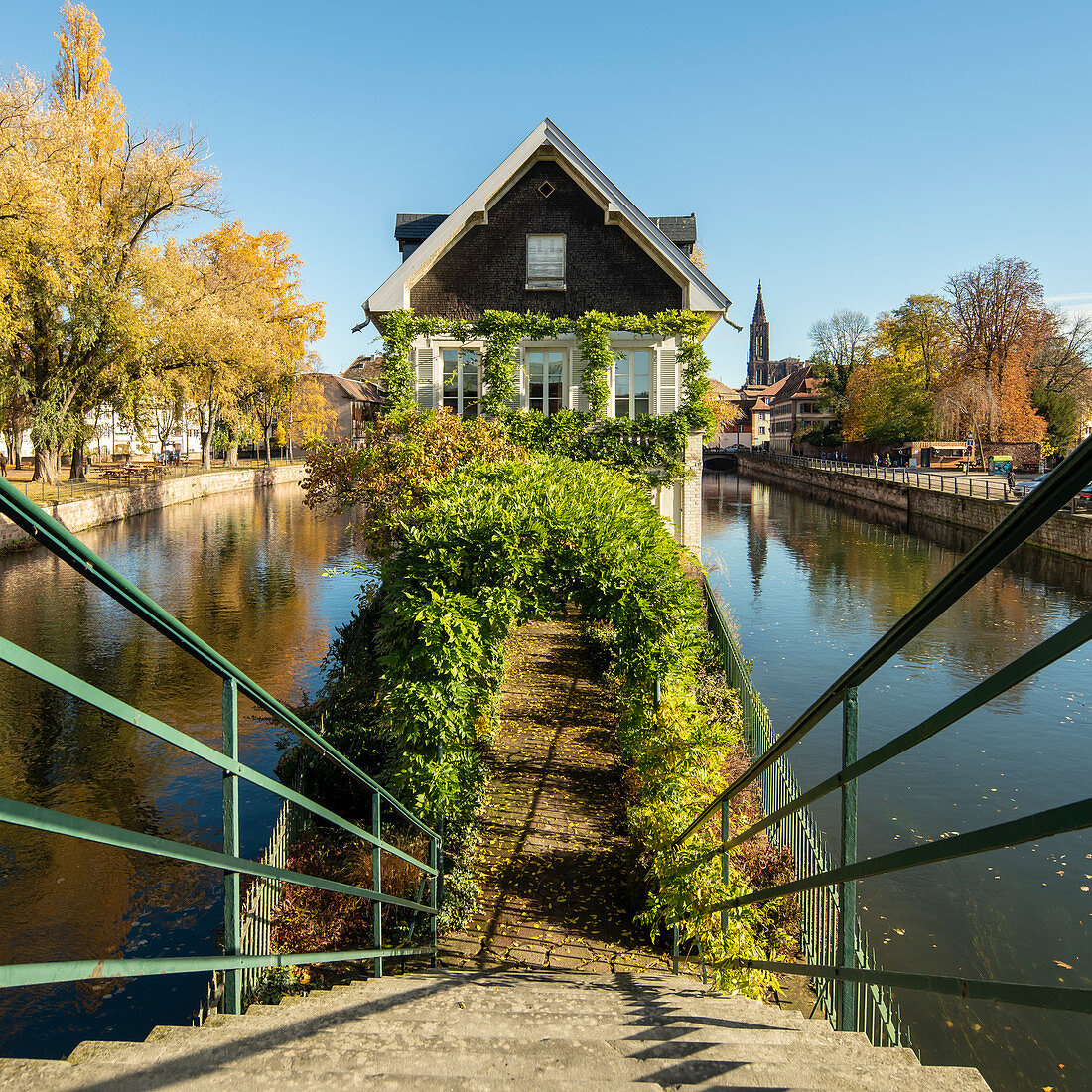 Central view from covered bridge (Ponts Couverts) to the idyllic Protection des Mineurs building, framed by canals in autumn, Strasbourg, Alsace-Champagne-Ardenne-Lorraine, France, Europe
