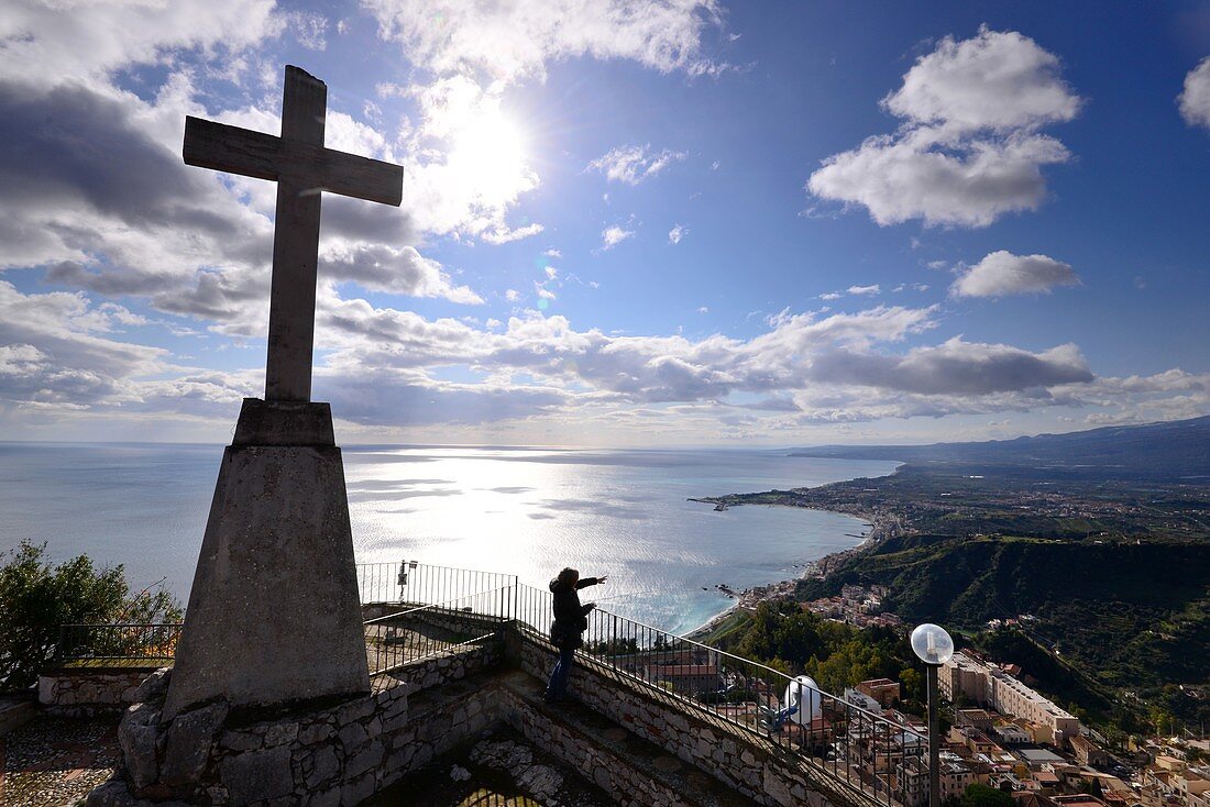 Cross and view and sea and coast, Santuario Madonna della Rocca, Taormina, east coast, Sicily, Italy