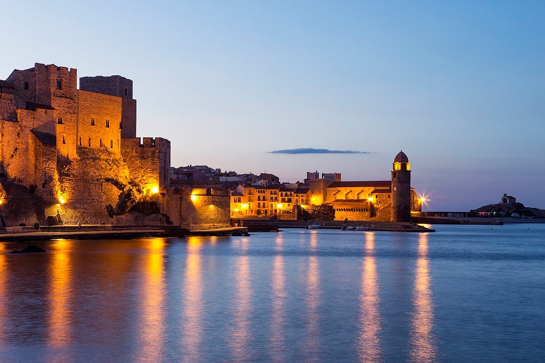 France, Pyrenees Orientales, Cote Vermeille, Collioure at twilight, royal castle and church of Notre Dame des Anges