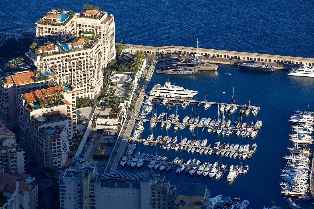 France, Alpes Maritimes, Cap d'Ail, the harbor and the buildings of Fontvieille district of Monaco left