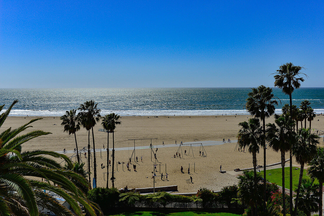 View of Santa Monica Beach with its exercise equipment and the Pacific Ocean in the background, California, USA