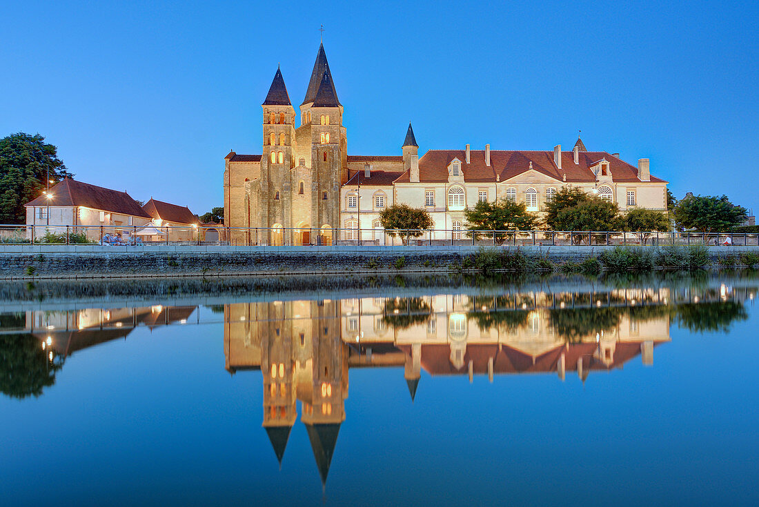 France, Saone et Loire, Paray le Monial, the Sacred Heart basilica and the convent buildings from the banks of the Bourbince river