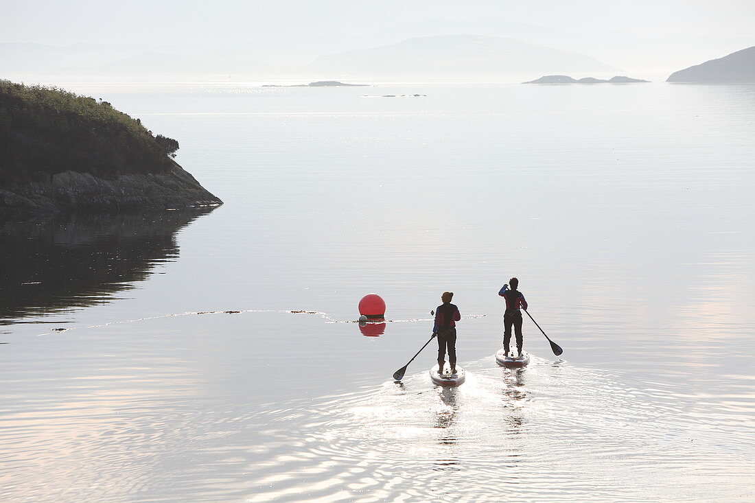 Stand-up paddle boarding in Tarbert Bay, Isle of Harris, Outer Hebrides