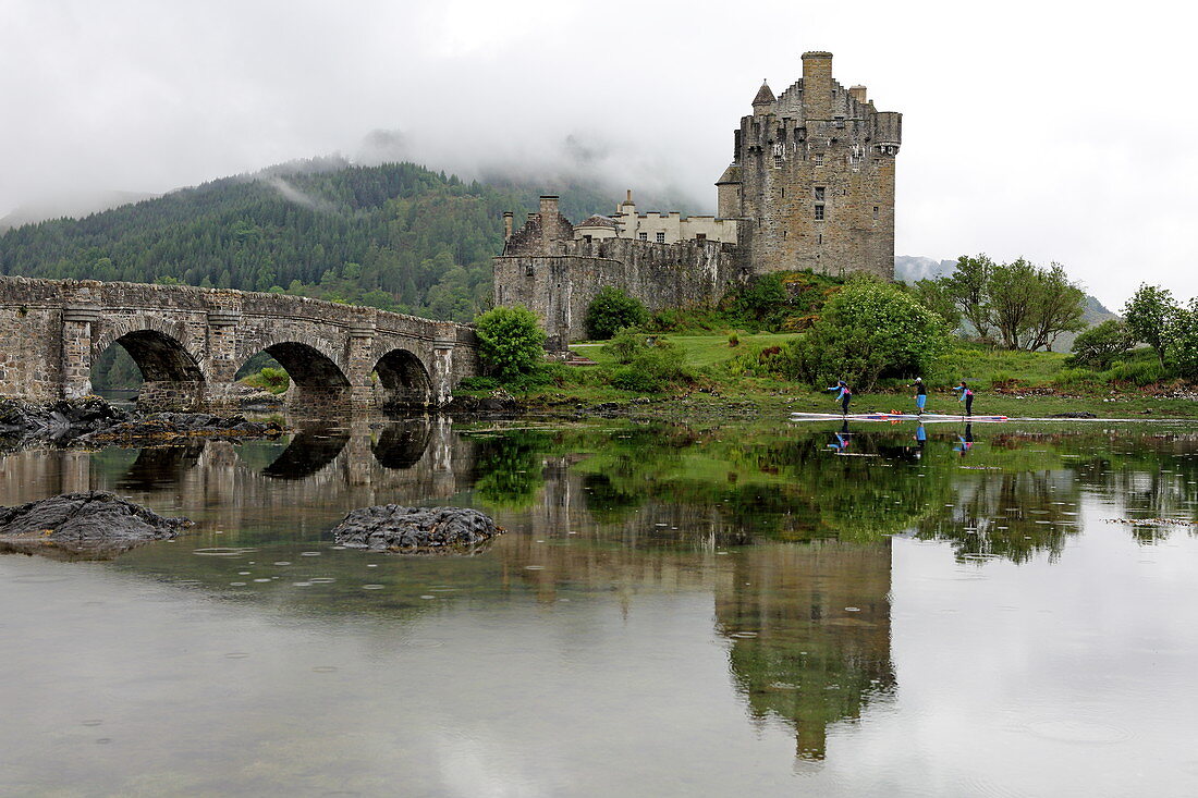 Stand up paddle boarding at Loch Duich, Eilean Donan Castle, Dornie, Highlands