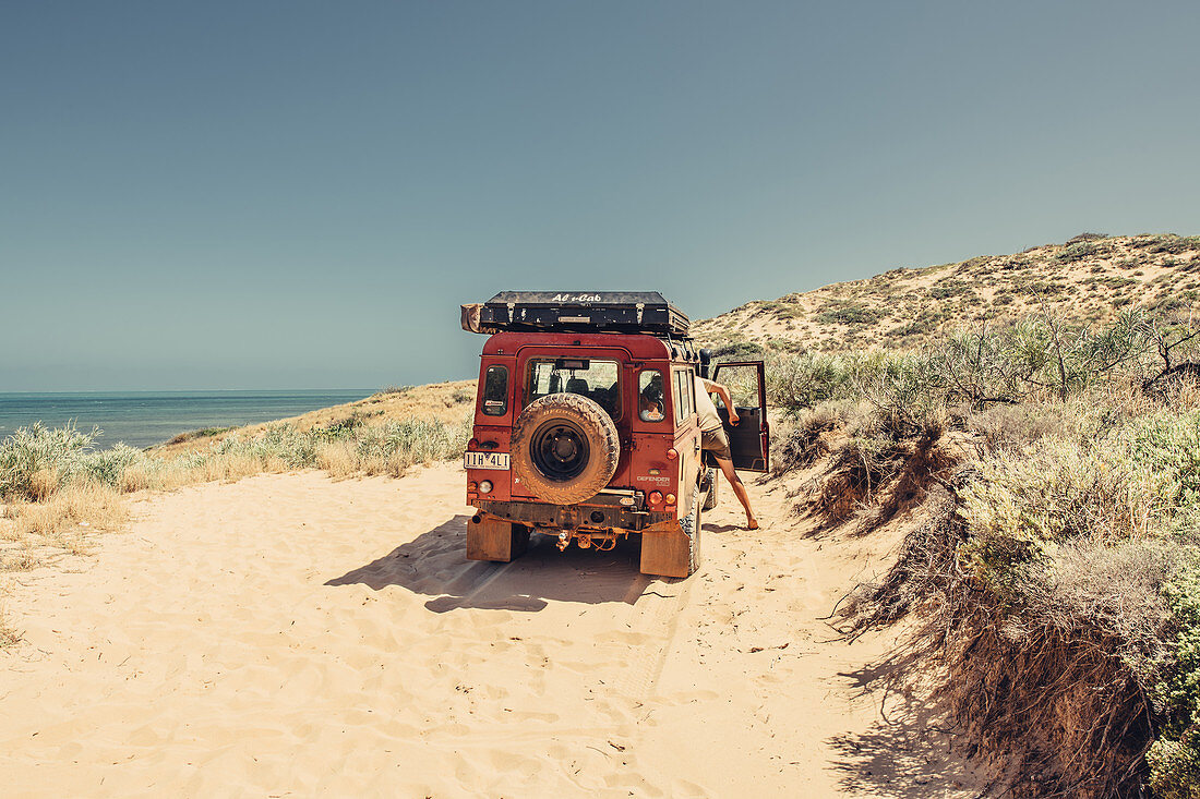 Four-wheel drive vehicle in the outback near Coral Bay in Western Australia, Australia, Oceania;