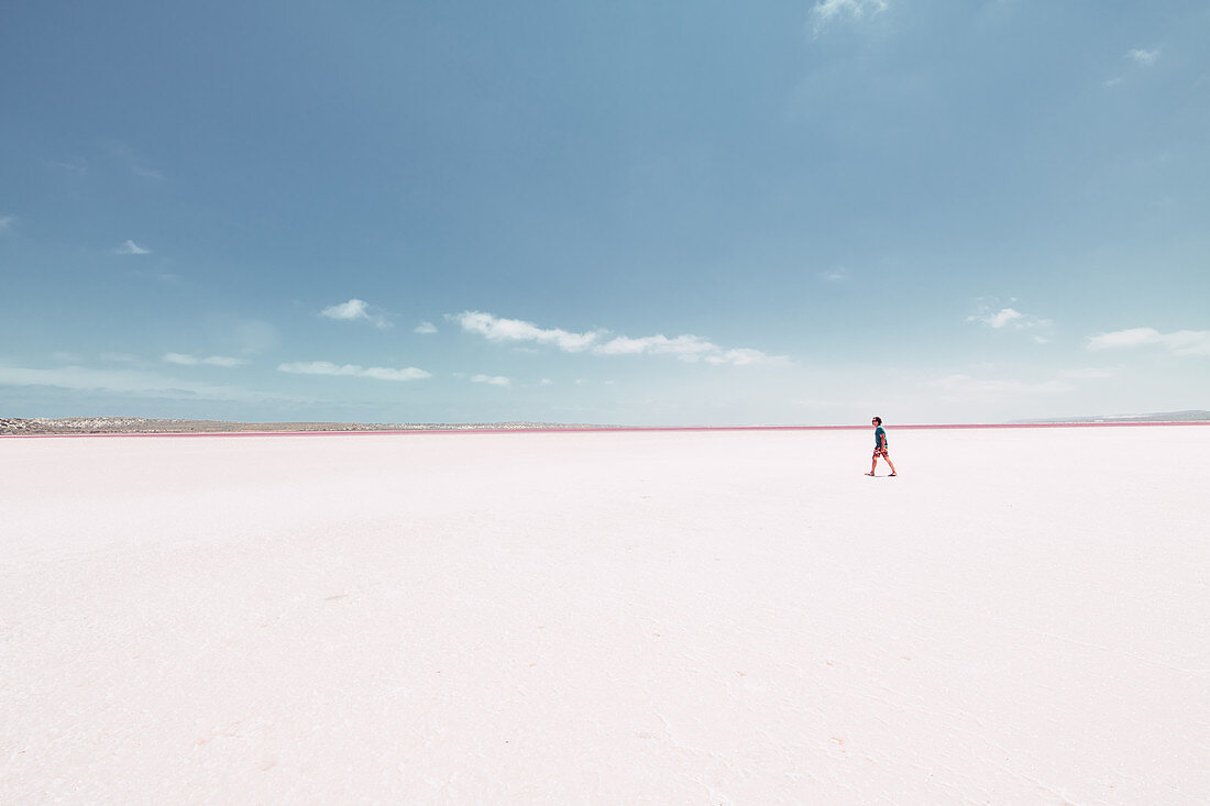 Male person walks on Pink Lake in Western Australia, Australia, oceans;